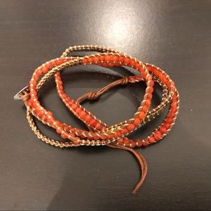 Orange bead and leather wrap bracelet